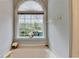 A bathtub with a view, complemented by a window and bright natural light at 500 Birch Forest Ln, Alpharetta, GA 30005