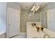 Bathroom featuring a double sink vanity and glass enclosed shower at 500 Birch Forest Ln, Alpharetta, GA 30005