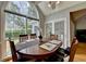Spacious dining room with a large window offering great natural lighting at 500 Birch Forest Ln, Alpharetta, GA 30005