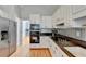 Updated kitchen with stainless steel appliances and abundant cabinet space at 500 Birch Forest Ln, Alpharetta, GA 30005