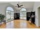 Bright living room features hardwood floors, high ceilings, and large windows at 500 Birch Forest Ln, Alpharetta, GA 30005