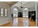 Bright living room features hardwood floors, high ceilings, and large windows at 500 Birch Forest Ln, Alpharetta, GA 30005