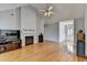 Spacious living room features hardwood floors and a fireplace at 500 Birch Forest Ln, Alpharetta, GA 30005