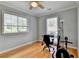 A well-lit office with hardwood floors and ample natural light at 500 Birch Forest Ln, Alpharetta, GA 30005