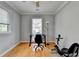 A spacious office with hardwood floors, natural light, and neutral paint at 500 Birch Forest Ln, Alpharetta, GA 30005