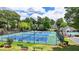 Community tennis courts next to a pool and clubhouse at 500 Birch Forest Ln, Alpharetta, GA 30005