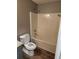 Full bathroom with toilet and shower/tub with shower head at 563 Fieldgreen Dr, Jonesboro, GA 30238