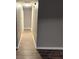 Hallway showcasing the neutral paint and wood-look flooring at 563 Fieldgreen Dr, Jonesboro, GA 30238