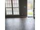 Living Room with large windows, neutral paint, and wood-look flooring at 563 Fieldgreen Dr, Jonesboro, GA 30238