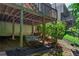 Under-deck area featuring swing, adding a playful touch to the outdoor space with natural surroundings at 7014 E Hills Way, Woodstock, GA 30189