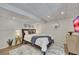 Bright basement bedroom with a comfortable bed and soft carpet at 7014 E Hills Way, Woodstock, GA 30189