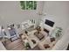 Open concept living room with lots of natural light, fireplace and hardwood floors at 7014 E Hills Way, Woodstock, GA 30189