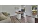 Cozy home office featuring a modern desk, comfortable seating, and natural light at 7014 E Hills Way, Woodstock, GA 30189