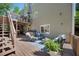 Relaxing outdoor living space with comfortable seating, hot tub and upper deck, ideal for leisure at 7014 E Hills Way, Woodstock, GA 30189