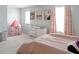Bright bedroom featuring light carpet, whimsical decor, and a cozy play tent at 20 Geranium Ln, Covington, GA 30016