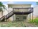 View of the backyard, back of the house, deck, and stairs at 2967 Albright Cmns, Kennesaw, GA 30144