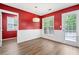 Cozy dining area features natural light, wainscoting, and flows into the outdoor living space at 2967 Albright Cmns, Kennesaw, GA 30144