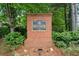 Westchester at Liberty Commons brick community entrance sign surrounded by lush greenery at 2967 Albright Cmns, Kennesaw, GA 30144
