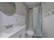 Bathroom with shower-over-bath, modern vanity, and large mirror at 3000 Kennesaw Nw Dr, Kennesaw, GA 30152