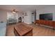 Bright and spacious living room featuring hardwood floors, gray walls and stylish furniture at 3000 Kennesaw Nw Dr, Kennesaw, GA 30152