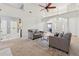 Cozy living room is open, bright, and inviting, with fireplace and neutral carpet at 1020 Regency Dr, Acworth, GA 30102