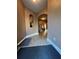 Inviting home entryway featuring an alcove, light wood floors and neutral paint at 1430 Lily Valley Dr, Lawrenceville, GA 30045