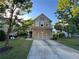 Inviting two-story home with well-manicured lawn and a two car garage at 1430 Lily Valley Dr, Lawrenceville, GA 30045