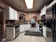 Well-lit kitchen with stainless steel appliances and breakfast area at 1430 Lily Valley Dr, Lawrenceville, GA 30045