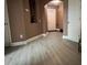 Welcoming living area with light-colored laminate flooring and neutral walls at 1430 Lily Valley Dr, Lawrenceville, GA 30045