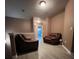 Upstairs loft area with seating at 1430 Lily Valley Dr, Lawrenceville, GA 30045
