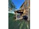 Covered patio area with furniture, providing an ideal space for outdoor relaxation at 1430 Lily Valley Dr, Lawrenceville, GA 30045