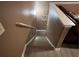 Staircase with white railings and neutral walls at 1430 Lily Valley Dr, Lawrenceville, GA 30045