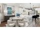 Eat-in kitchen with granite counters, stainless appliances, and a pendant lighting at 172 Aspen Hall Dr, Canton, GA 30115