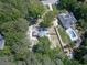 Aerial view of the property showcasing the home, backyard, and surrounding landscape at 173 Springwater Trce, Woodstock, GA 30188