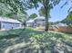 Expansive backyard with a deck, firepit, and plenty of space for entertaining at 173 Springwater Trce, Woodstock, GA 30188