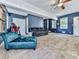 Large bonus room features multiple windows, carpeting, and comfortable seating options at 173 Springwater Trce, Woodstock, GA 30188