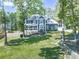 Stately two-story home with attached garage and well-manicured lawn at 173 Springwater Trce, Woodstock, GA 30188