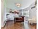 Well-lit home office featuring hardwood floors and ample workspace at 173 Springwater Trce, Woodstock, GA 30188