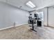 This office features carpet floors, white walls, and a window with natural light at 173 Springwater Trce, Woodstock, GA 30188