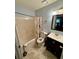 Bathroom featuring a shower-tub combo, vanity, and modern fixtures at 235 Creekside Way, Mcdonough, GA 30252