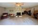 Inviting living room with a cozy fireplace and ample space for seating at 235 Creekside Way, Mcdonough, GA 30252