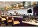 Upscale bar area with granite countertops, wood accents, and plentiful glassware, ideal for entertaining guests at 3344 Peachtree Rd # 3505, Atlanta, GA 30326