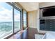 Bedroom with built-in storage and large windows offering expansive views at 3344 Peachtree Rd # 3505, Atlanta, GA 30326
