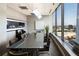 Conference room with modern table and seating, and expansive windows offering an impressive city view at 3344 Peachtree Rd # 3505, Atlanta, GA 30326