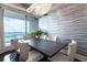 Dining area with city views, modern lighting, and textured wall decor at 3344 Peachtree Rd # 3505, Atlanta, GA 30326