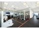 Fully equipped gym with ample weights, machines, and mirrored walls at 3344 Peachtree Rd # 3505, Atlanta, GA 30326