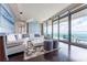 Bright living room features modern decor and large windows with stunning views at 3344 Peachtree Rd # 3505, Atlanta, GA 30326