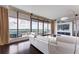 Living room with floor-to-ceiling windows showcasing panoramic city views at 3344 Peachtree Rd # 3505, Atlanta, GA 30326