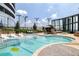 Luxury pool and patio area with comfortable seating and city view at 3344 Peachtree Rd # 3505, Atlanta, GA 30326
