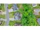 Aerial view of a house with a fenced backyard featuring a patio area at 4170 Haynes Mill Nw Ct, Kennesaw, GA 30144